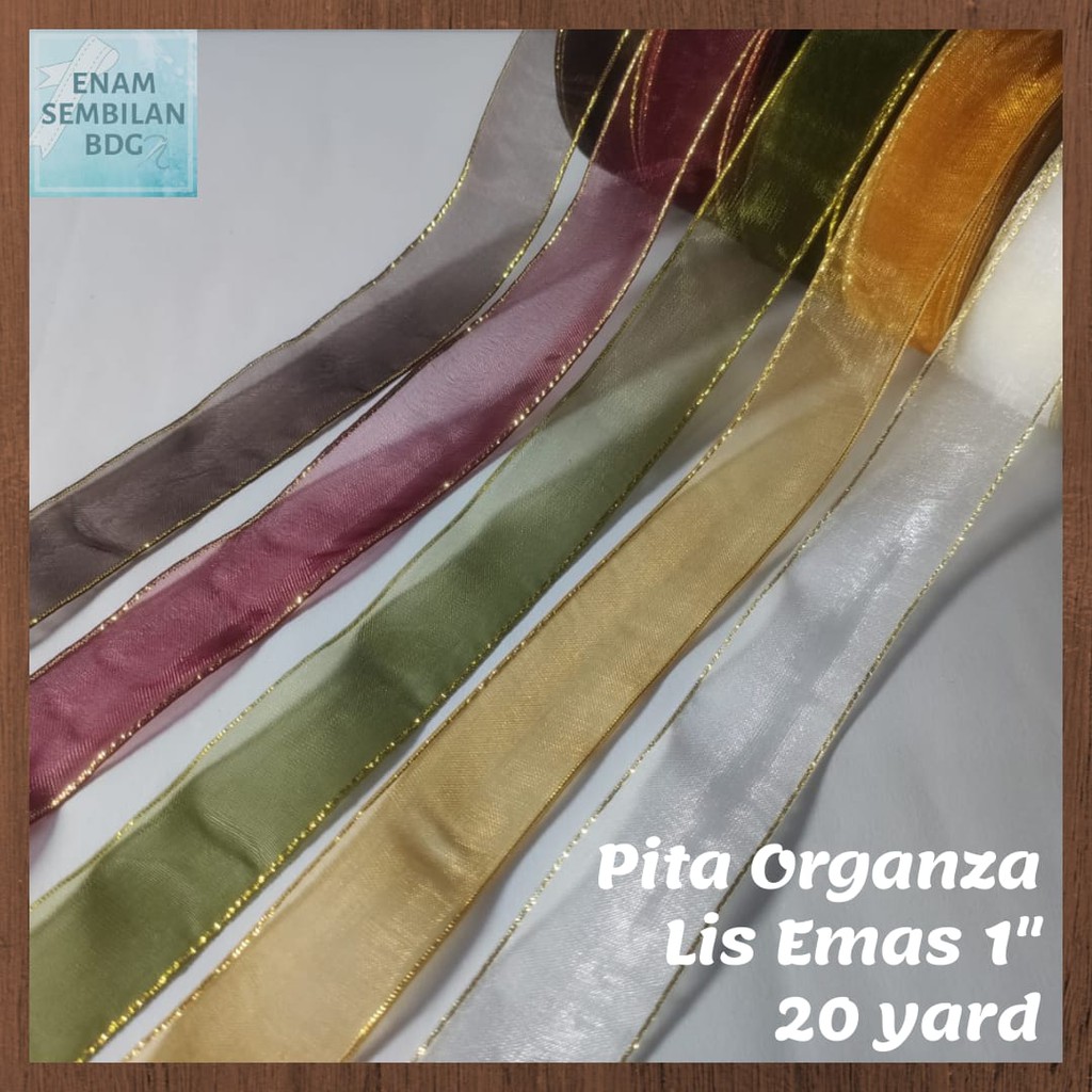 

PITA ORGANZA LIS EMAS 1" HAMPERS LEBARAN IDUL FITRI / PITA ORGANDI / PITA KACA PER ROL ISI 20YARD