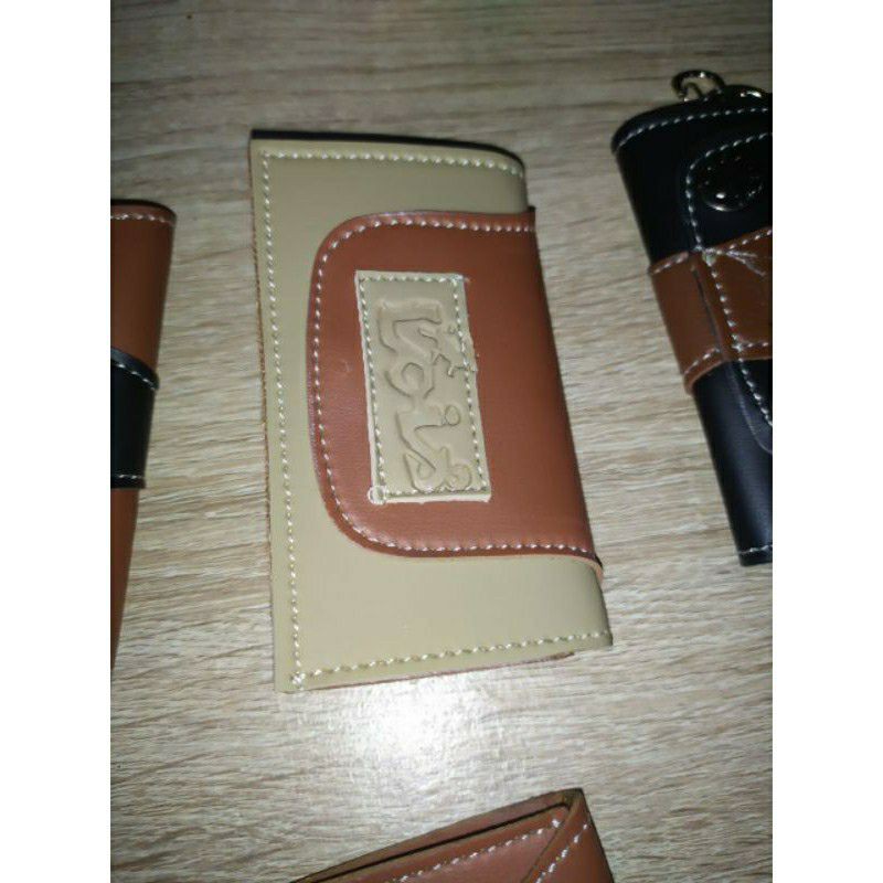 dompet stnk kulit sintetis / gantungan kunci stnk Levis Lois