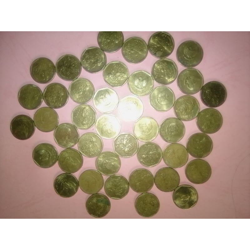 Rp. 50 Komodo, Rp. 100 Kerapan sapi