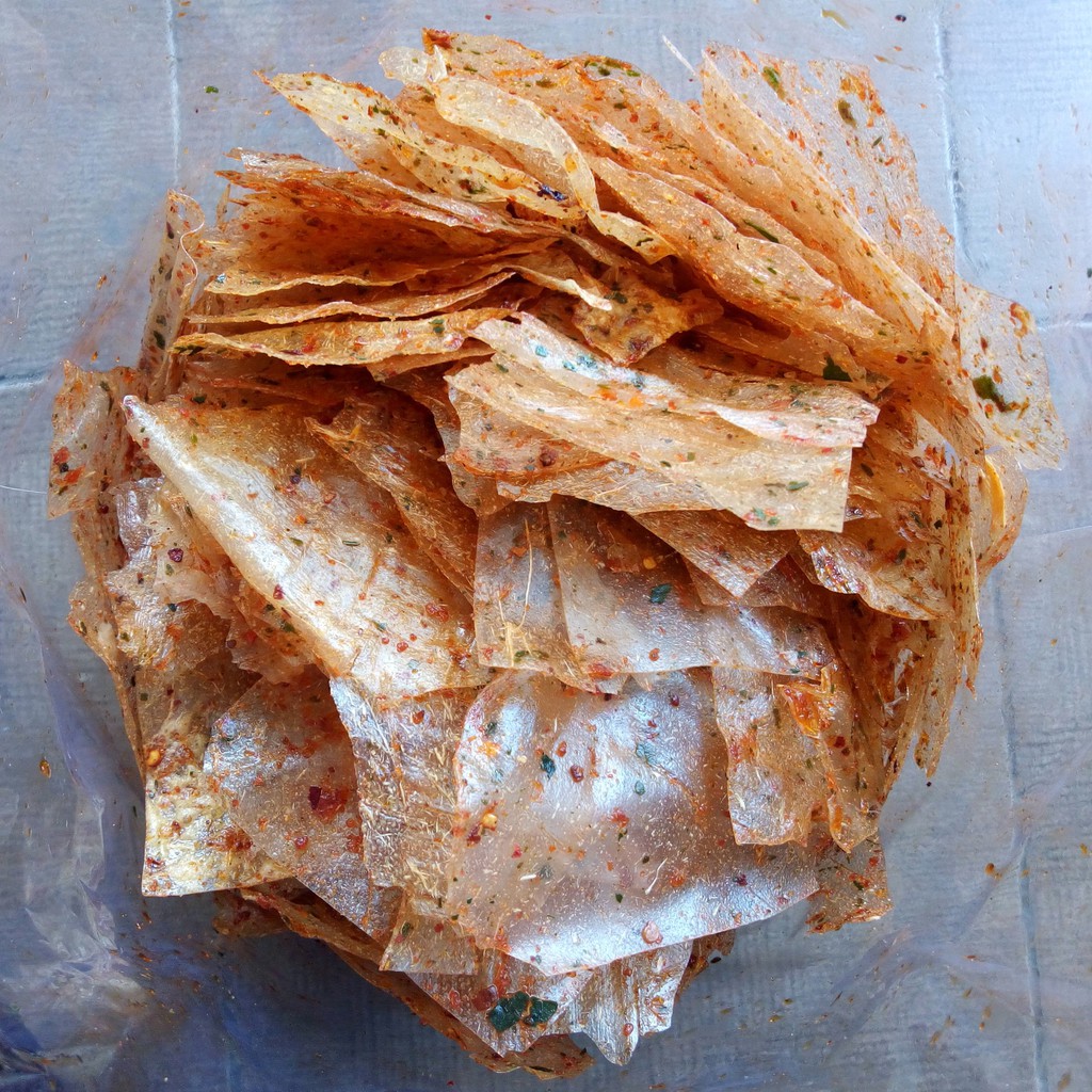 

Kaca Merah keripik kaca pedas kemasan bal 1kg TRIWANDI SNACK