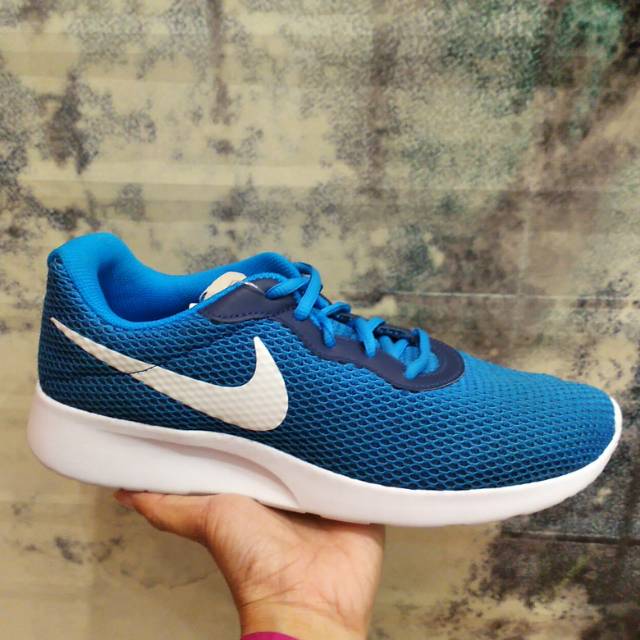 nike tanjun size 14