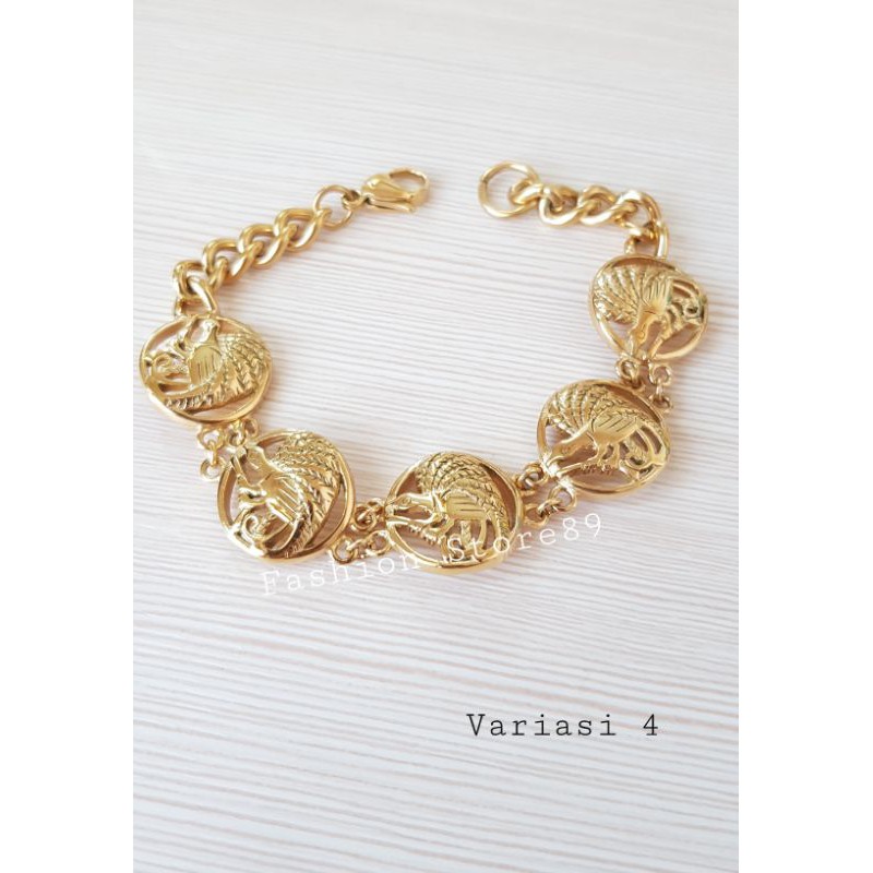 Gelang Tangan Cendrawasih / gelang import cendrawasih titanium gold antikarat import