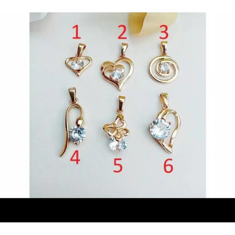 liontin mata satu titanium gold