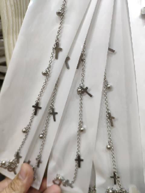 Gelang titanium untuk tangan model salib