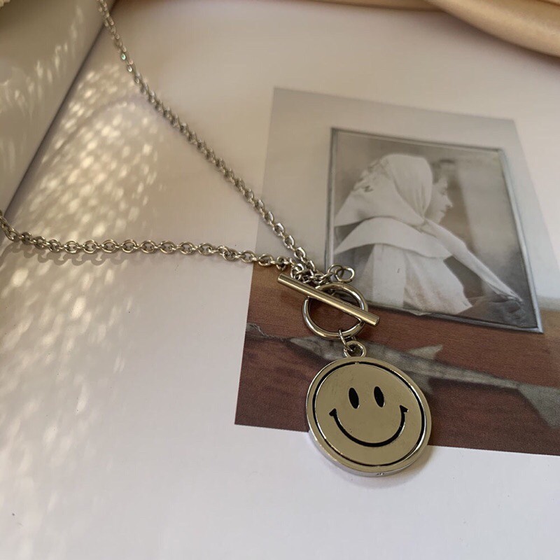 Rotating smiley chain - kalung unisex