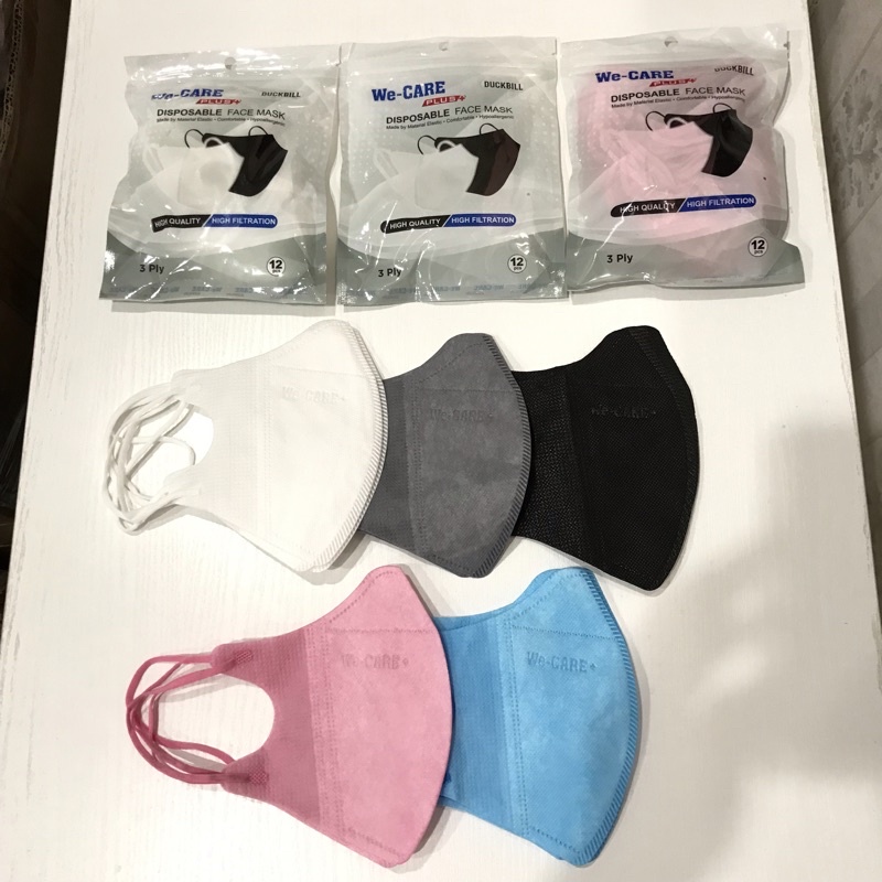 We Care Duckbill Earloop Sachet isi 12pcs Ziplock