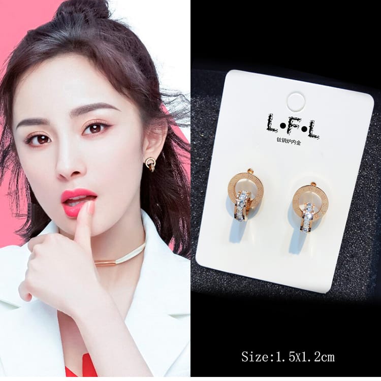 Jewerlyhouse.medan Anting Tusuk Titanium Motif Angka Romawi Berlian
