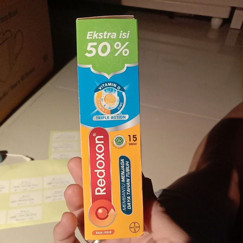 Redoxon multivitamin isi 15 tablet triple action rasa jeruk