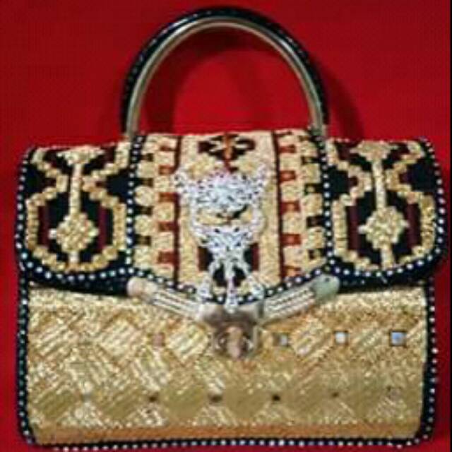 Tas tapis asli