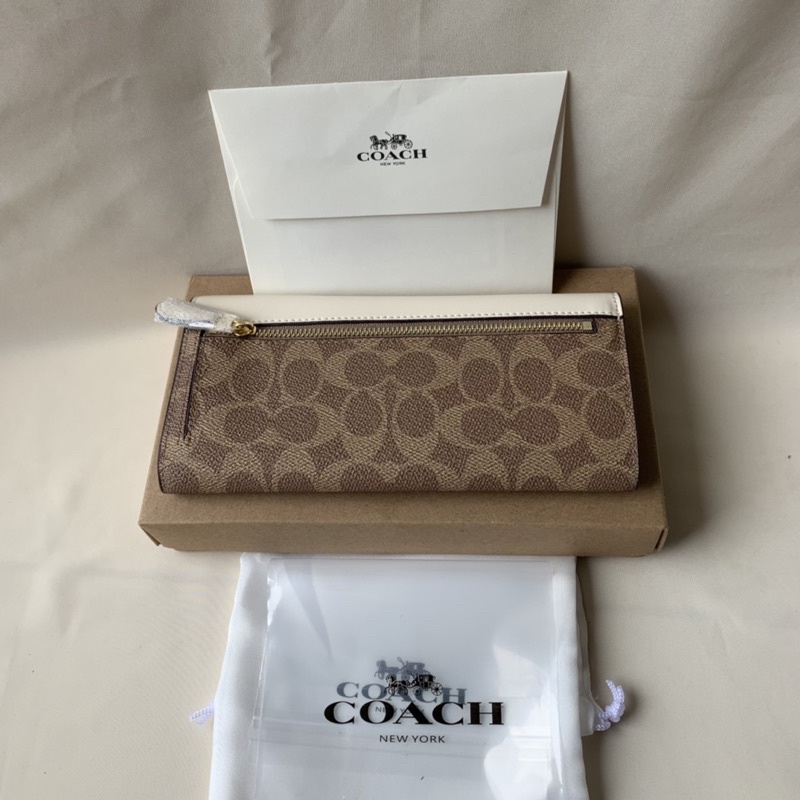 SOFT WALLET IN COLORBLOCK SIGNATURE CANVAS (COACH 31547)