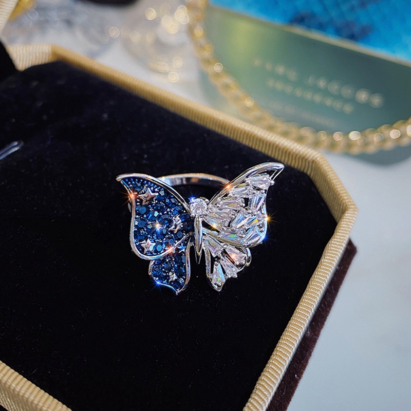 Cincin Model Terbuka Adjustable Desain Kupu-Kupu Biru Aksen Zircon Untuk Wanita