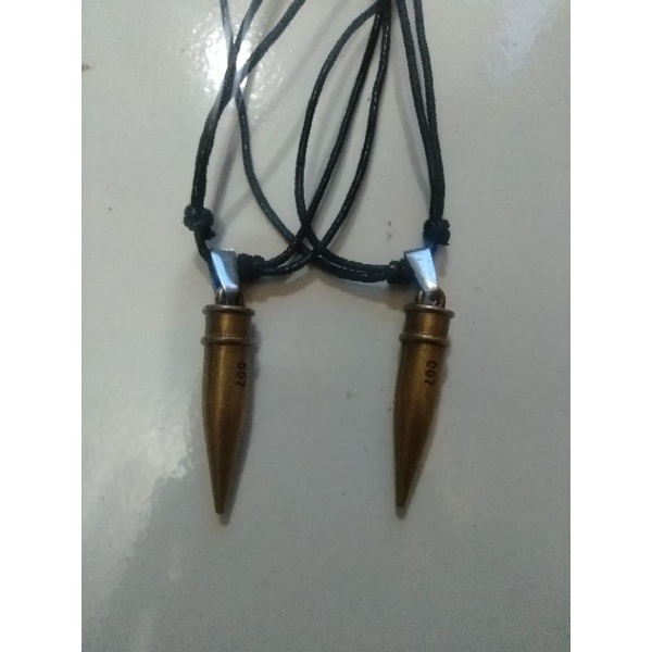 kalung peluru runcing