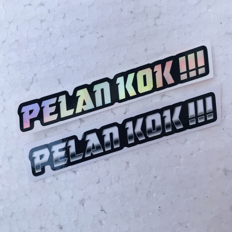 

Sticker Pelan Kok Hologram dan Orajet Laminasi Glossy