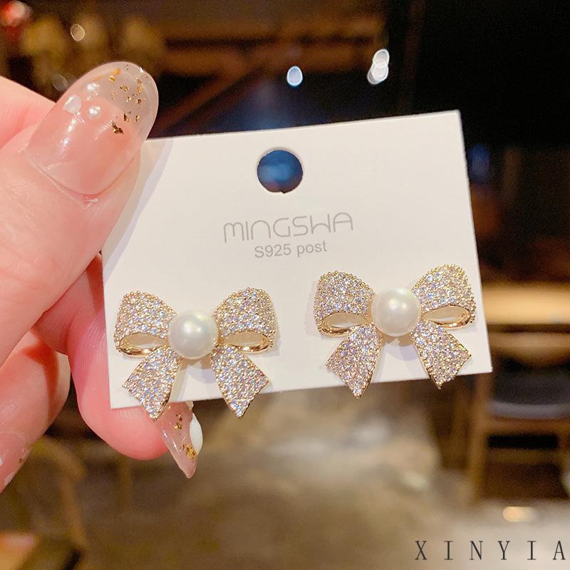 Xia.id Anting Tusuk Gantung Desain Pita Hias Mutiara Gaya Trendy / Simple Untuk Wanita