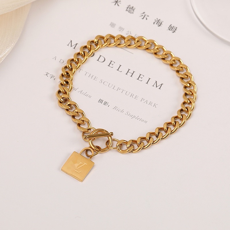 gelang titanium sisik naga lv cantik