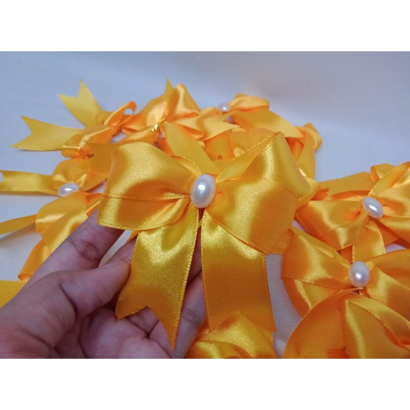 

aplikasi pita satin / pita satin souvenir / pita satin siap pakai warna golden orange