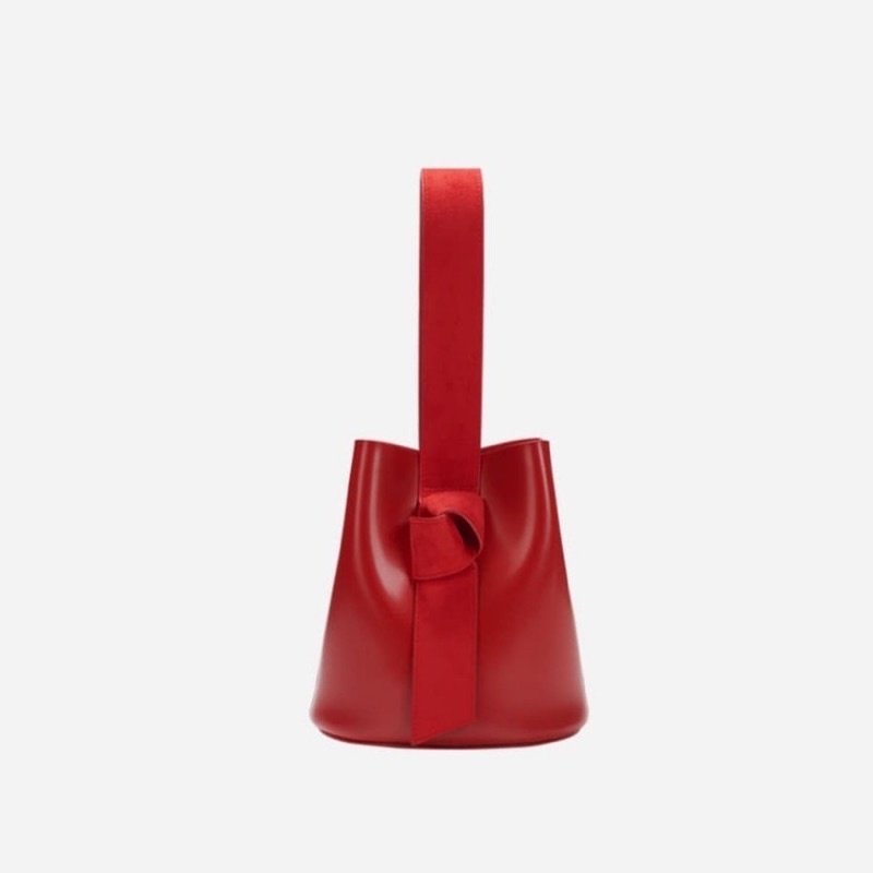 KWANI MICRO SUEDE KNOT BUCKET BAG