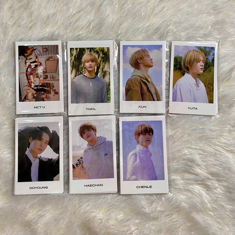 sharing nct mini collect book polaroid from home taeil kun yuta doyoung haechan chenle