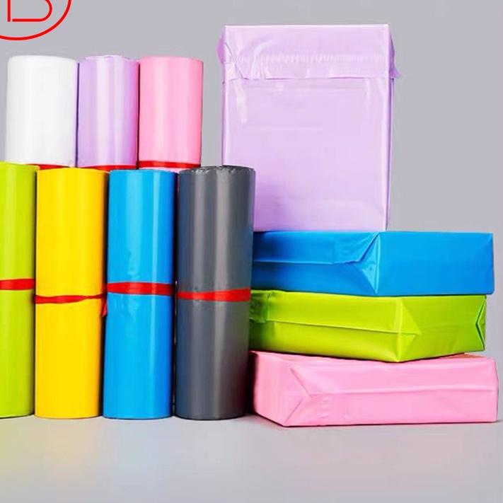 

Hot - Polymailer / Plastik Packing Online Shop 40X50CM LDPE WARNA Glossy Isi 100Pcs Lem Perekat TerGrosir