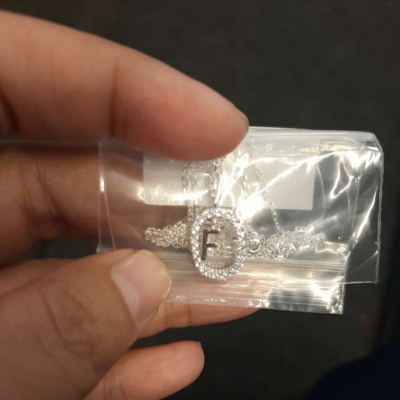 PD Paola huruf F by luino