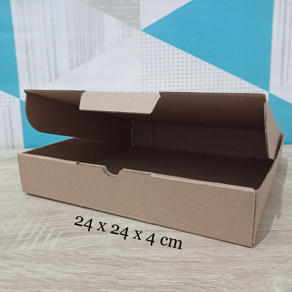 

Kardus 24 x 24 x 4 cm....Die Cut kotak aksesoris dll
