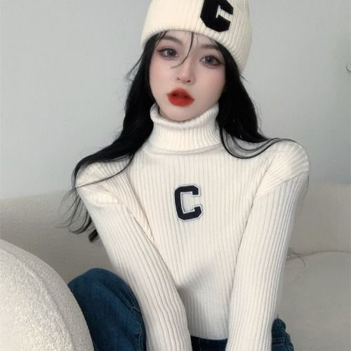 Sweater turtleneck pendek wanita 2021 musim dingin desain baru pakaian rajut niche gaya Barat kemeja