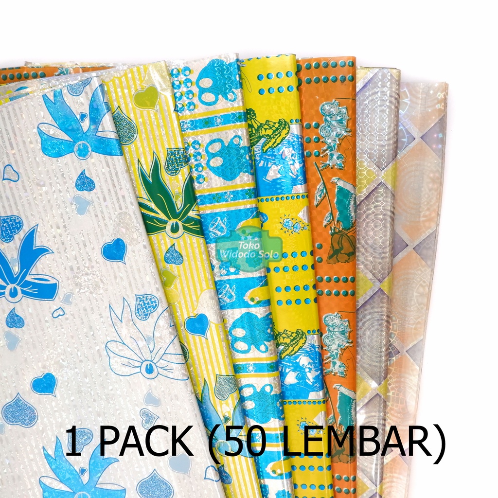 

Plastik Kado Hologram Garis Putih Fancy 50x65cm - 50 Lembar