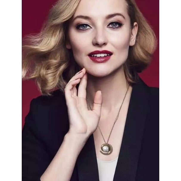 pearl necklace and brooch