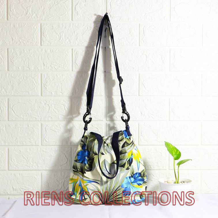 RIENS COLLECTIONS. SLING BAG TAS SELEMPANG KANVAS MOTIF BUNGA SEPATU BIRU