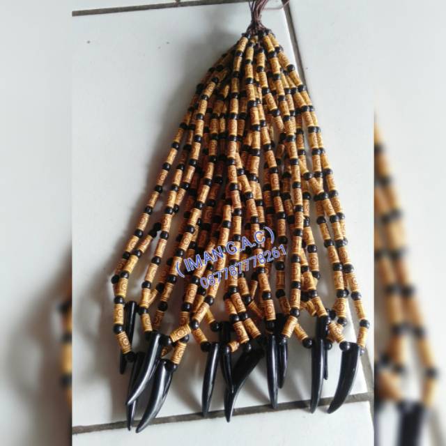 Kalung kayu taring hitam/kalung fashion peria