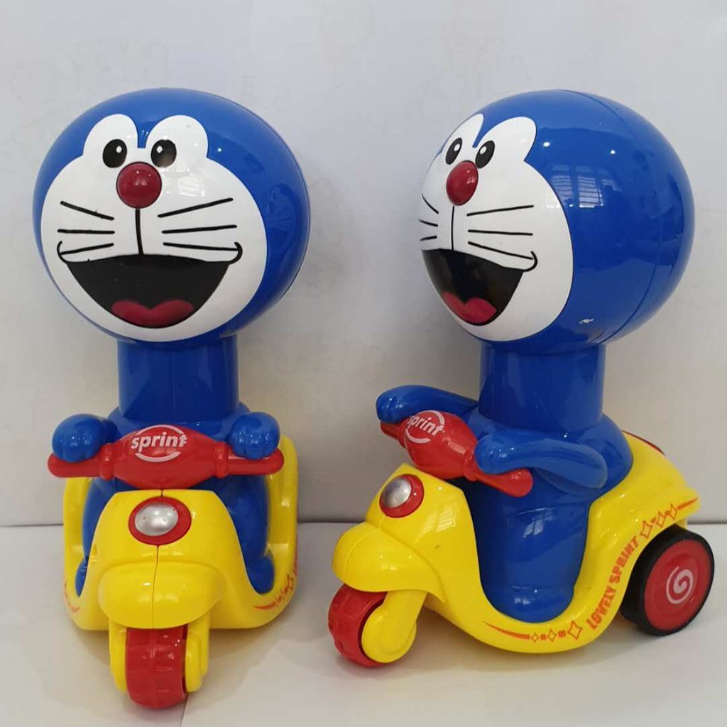 Mainan Motor Vespa Manual Doraemon [ Bisa Jalan Tanpa Batrei ]