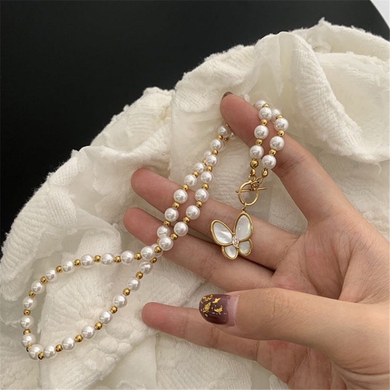 Butterfly pearl necklace