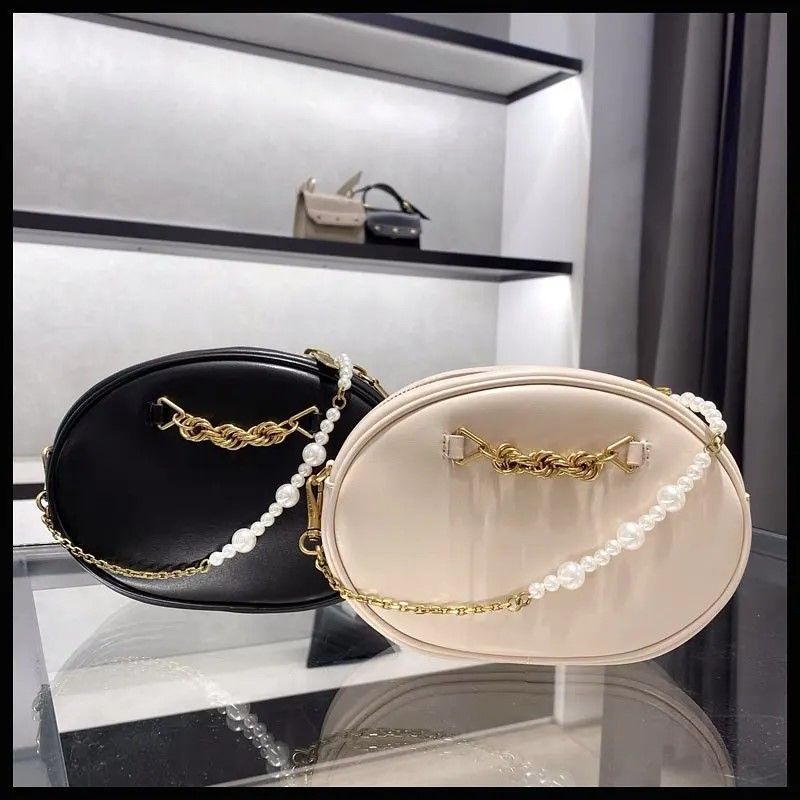 4.4 SALE | CK Chain-Embellished Oval Crossbody Bag