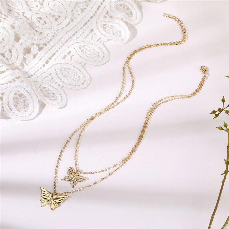 Kalung Choker Multilayer Dengan Liontin Kupu-Kupu Hollow Warna Emas Untuk Wanita