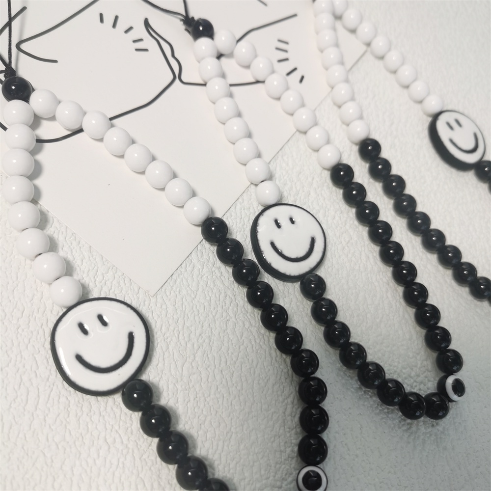 Tali Lanyard Motif Smiley Face Warna Hitam Bahan Akrilik Anti Hilang Untuk Handphone