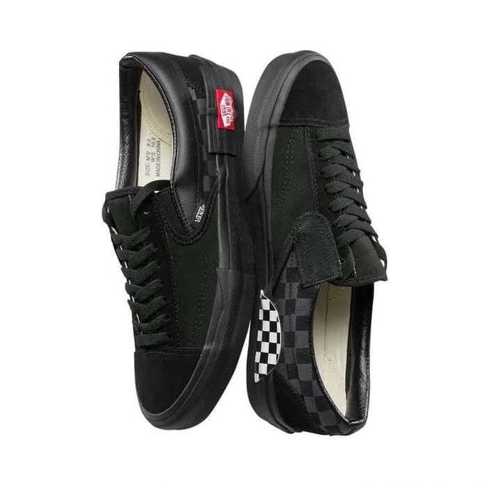 vans cut and paste slip on black