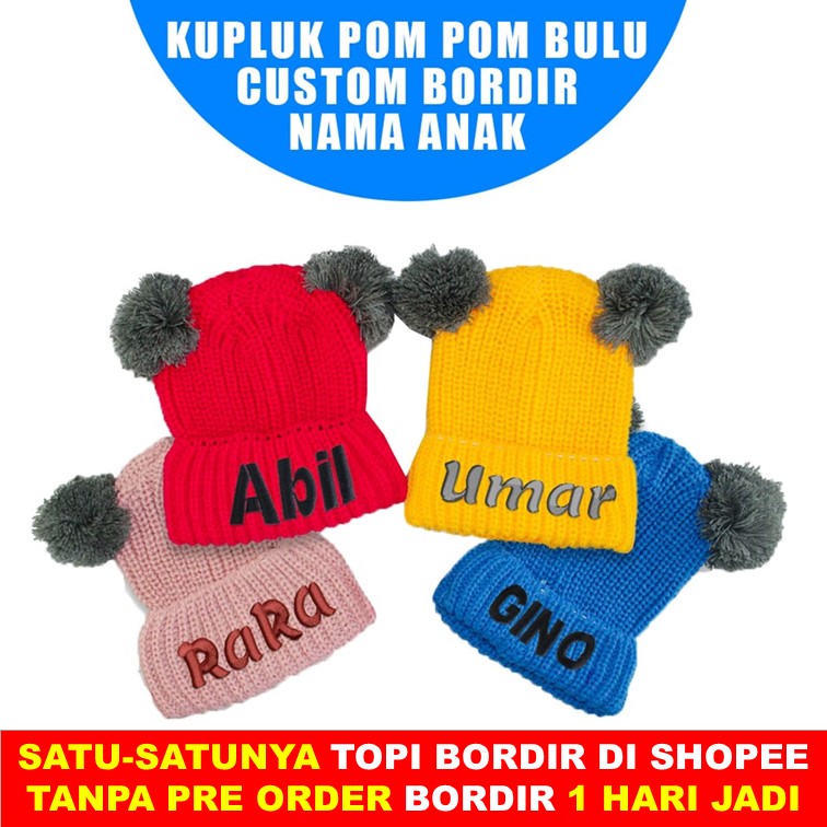 Kupluk Bayi Polos Bahan WOL Model Pompom Bordir Nama Anak