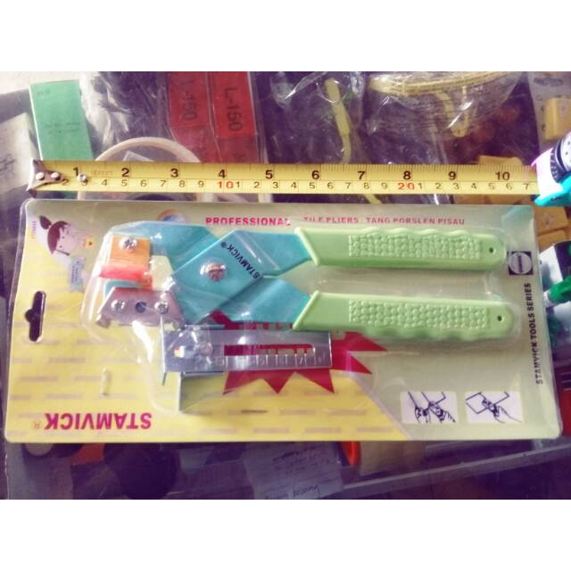 potong keramik manual