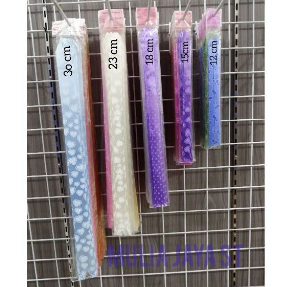 

Pita Serut 30 cm / pita kado motif / pita serut motif