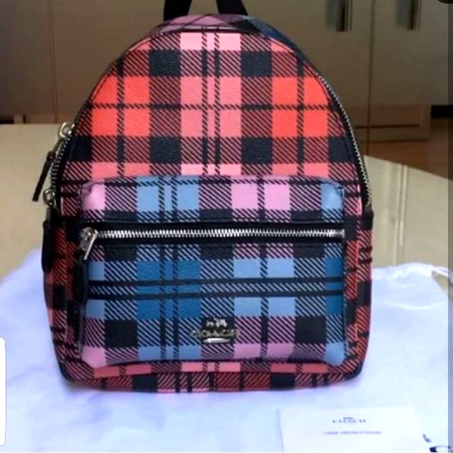 Preloved coach mini charlie bagpack