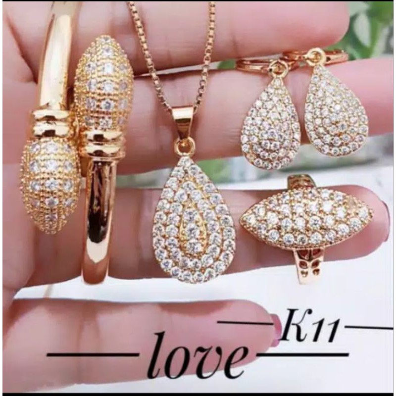 perhiasan wanita satu set oval kalung gelang anting cincin