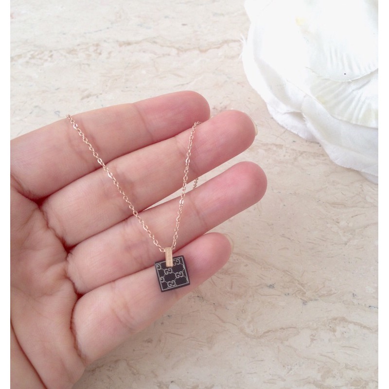 Kalung gucci keramik hitam