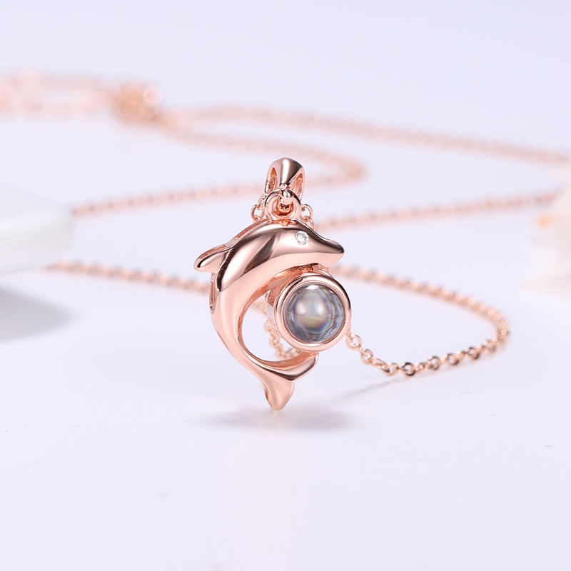 Kalung Liontin Lumba-Lumba Model Hollow Out Bahan Stainless Steel Warna Rose Gold Untuk Wanita