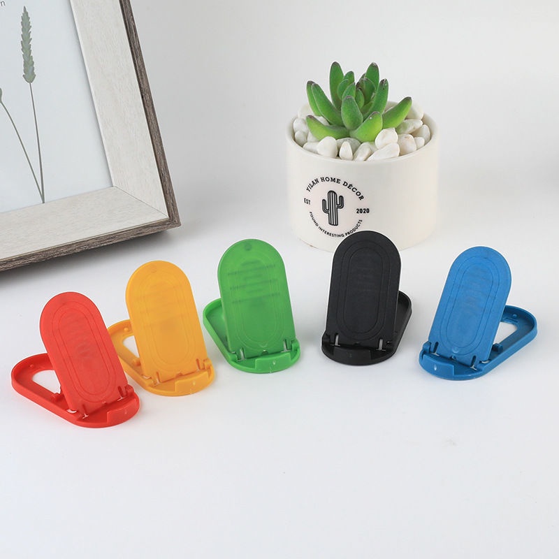 (Sold One By One) Stand Dudukan Handphone Model Lipat Bahan Plastik Warna Acak