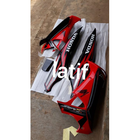 body supra x 125 lama merah ferarry