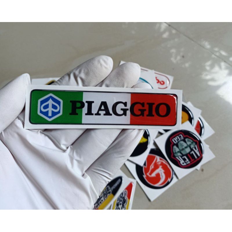 

Stiker timbul lentur Piaggio persegi