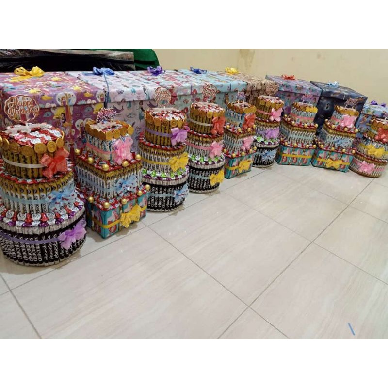

kado tumpeng snack + uang pecahan 50ribu / 100rb