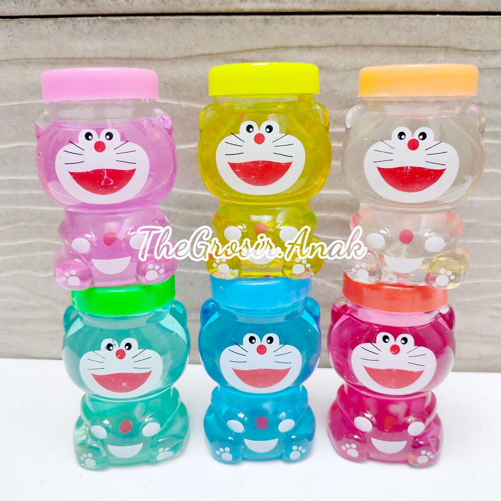 SLIME CLEAR JELLY DORAEMON BEAR BERUANG WANGI BOTOL BOLA GABUS