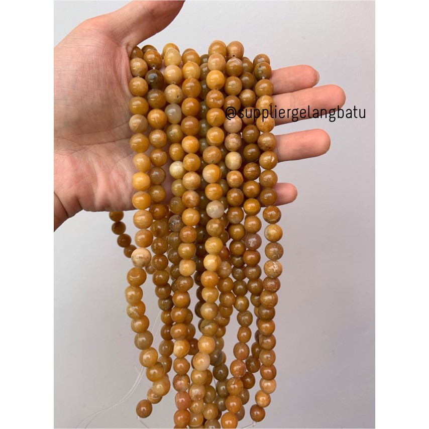 bahan batu Manigajah 10mm kuning natural polish corak retak fashion