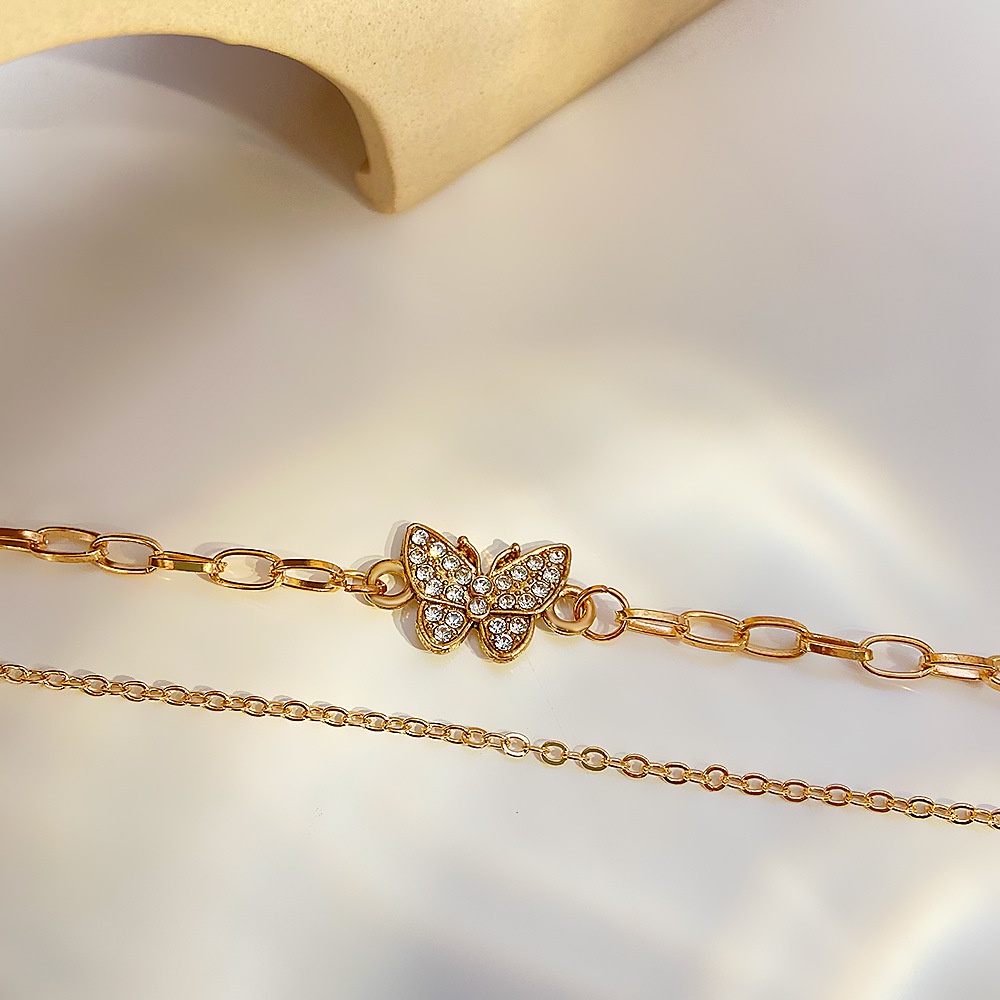 Gelang Tangan Rantai Metal Tipis Ringan Desain Kupu-Kupu Hias Berlian Metalik Untuk Wanita